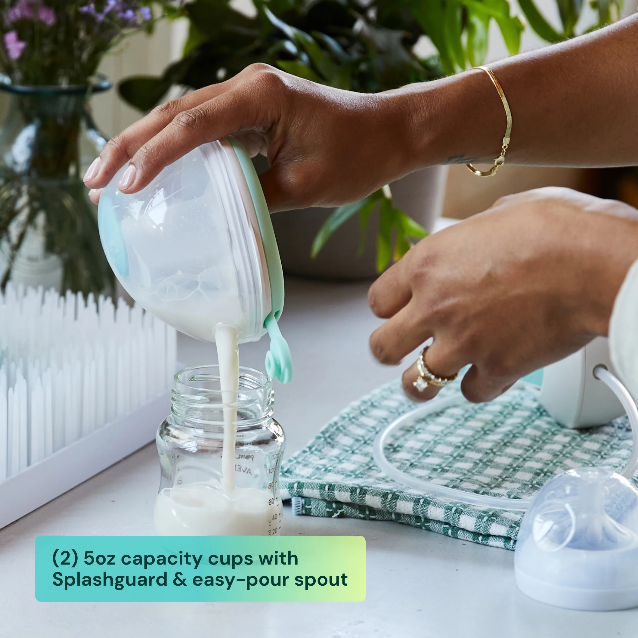 Wave 2-in-1 doppelte manuelle tragbare Milchpumpe mit Bechern